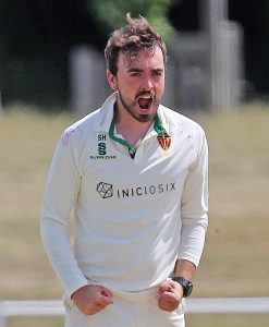 Photo of Sam in a 1st XI fixture during a cricket match.