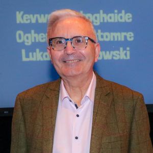 Ron Mills stood on his own smiling at a Jack petchey Foundation event.